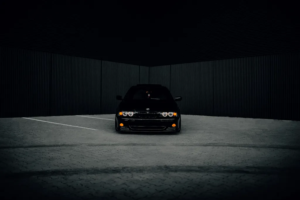 unsplash_lAGz00ZZnO0_premium cars black background.webp